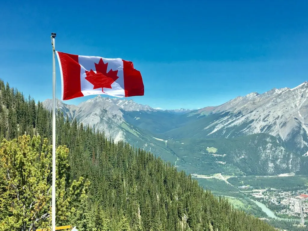 canada-flag-with-mountain-range-view-756790(1)